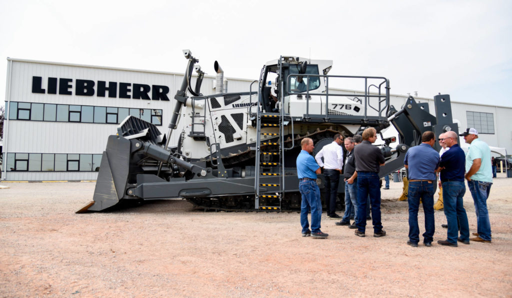 Crowd of customers discuss the PR 776 with product specialists