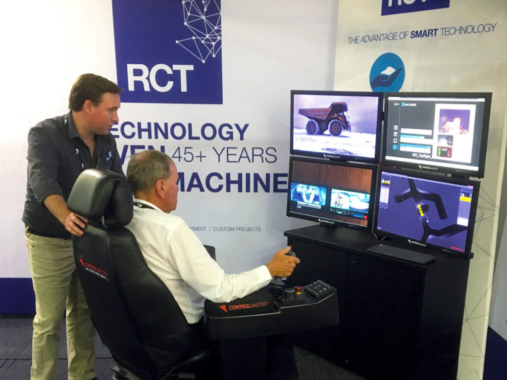 Kalgoorlie Mayor John Bowler operates the Automation Centre at RCT's stall at the expo.