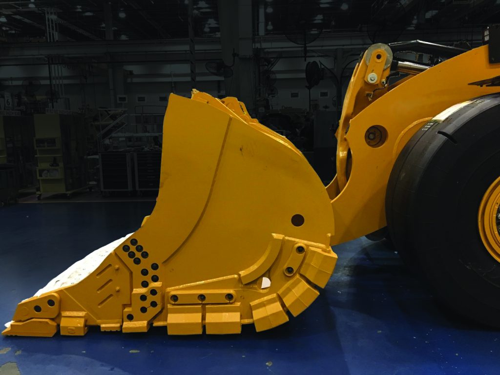New Cat® bolttogether buckets for underground loaders lower costs for